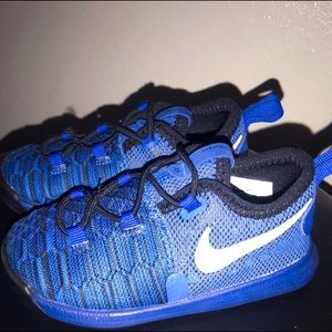 Toddler size 6 NIKE KD blue tennis shoes
